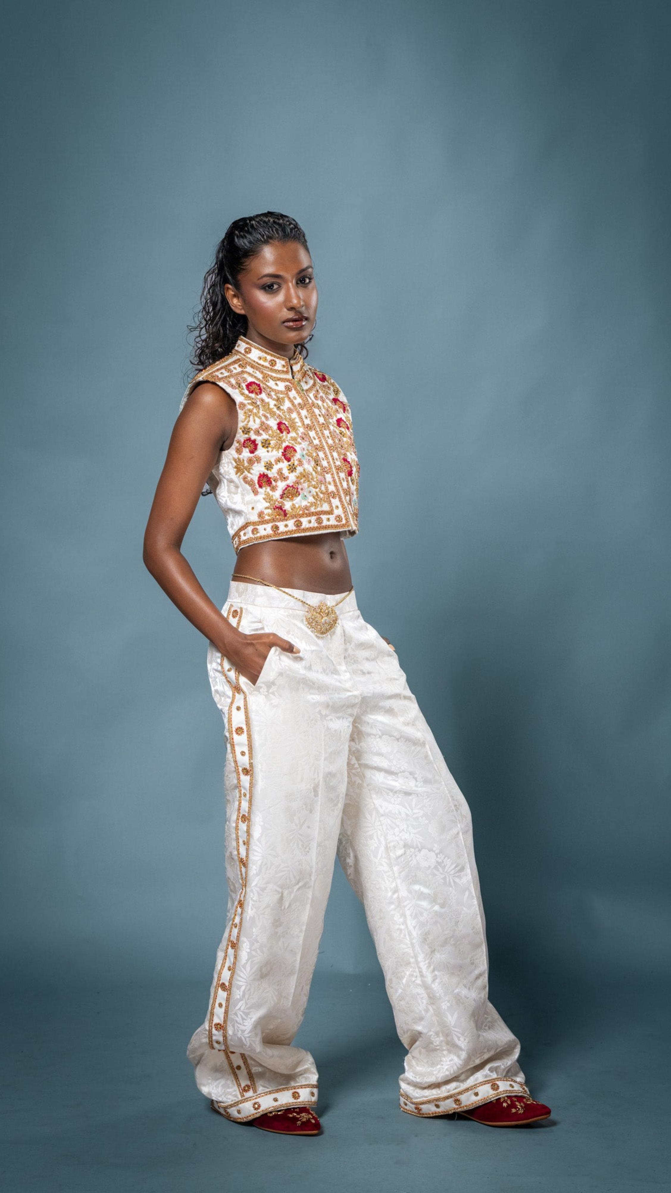 LOVI Sleeveless White Manike Jacket & Tuxedo Pant